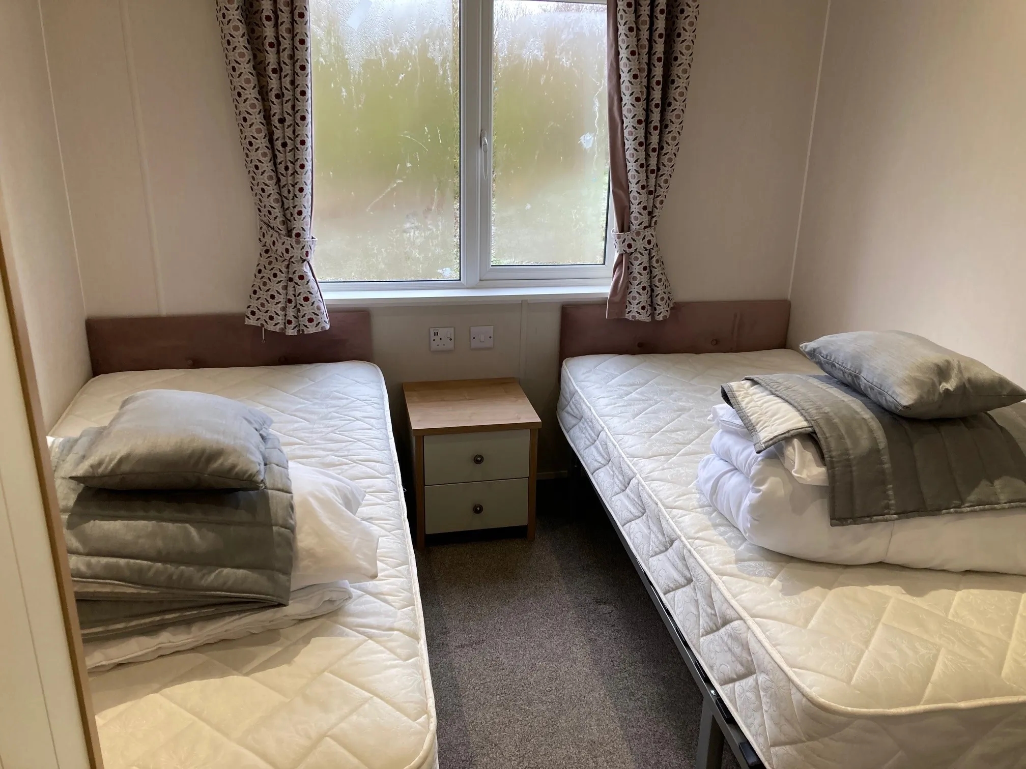 2023 Willerby Portland Lodge left side twin bedroom