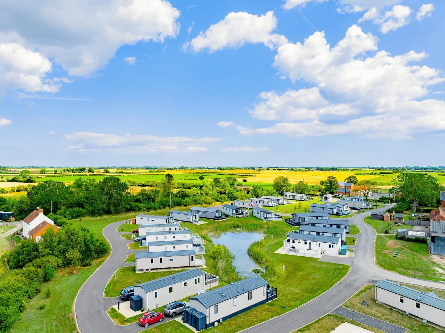 Helsey Farm Aerial Shot Pond Caravans