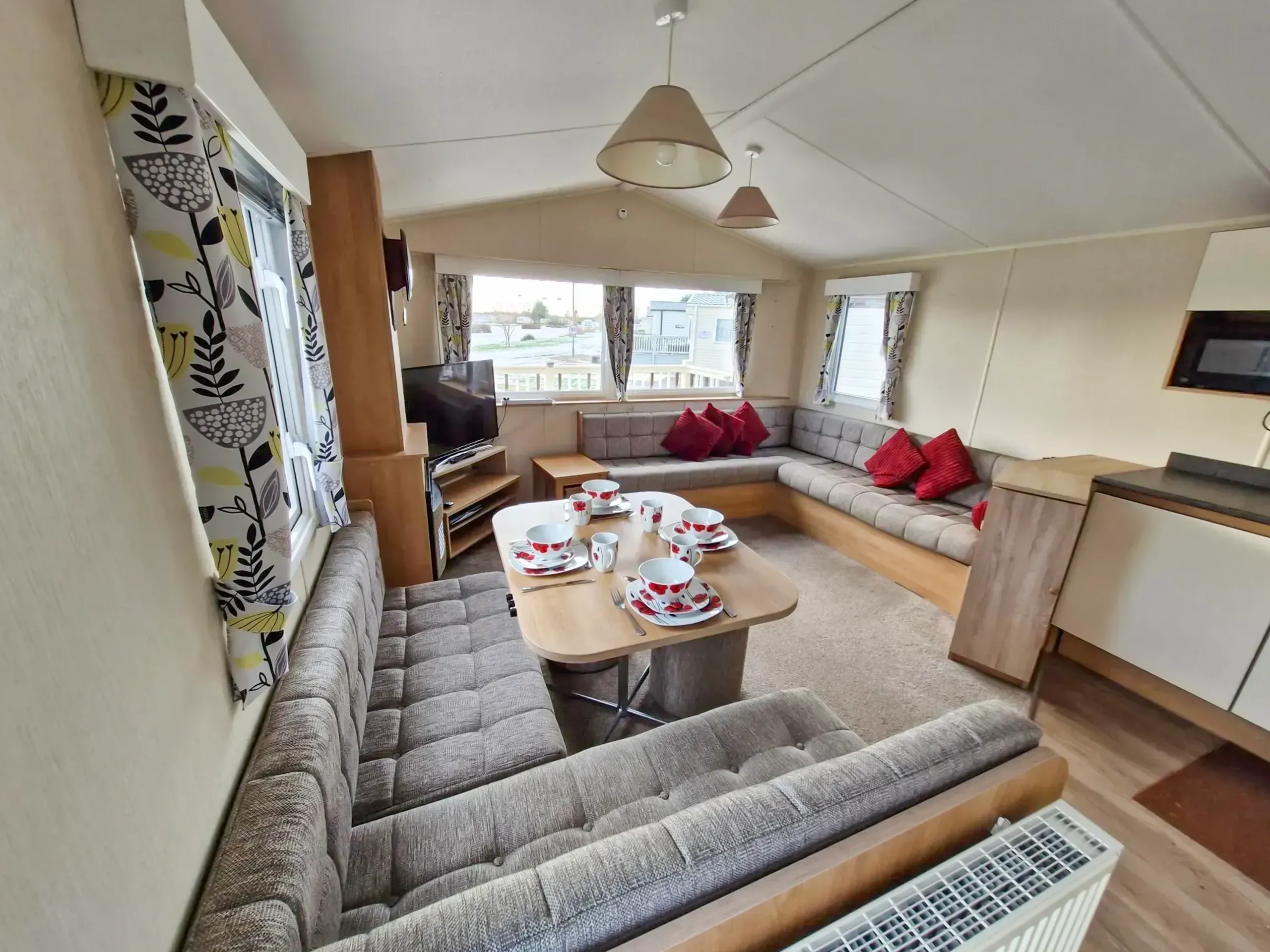 Open-plan lounge in the 2018 Willerby Mistral holiday home