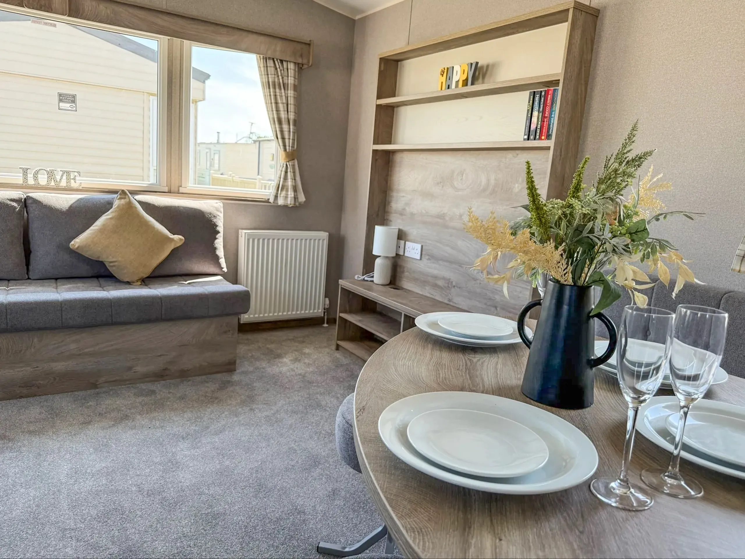 Open-plan lounge and dining in the 2026 ABI Seaspray