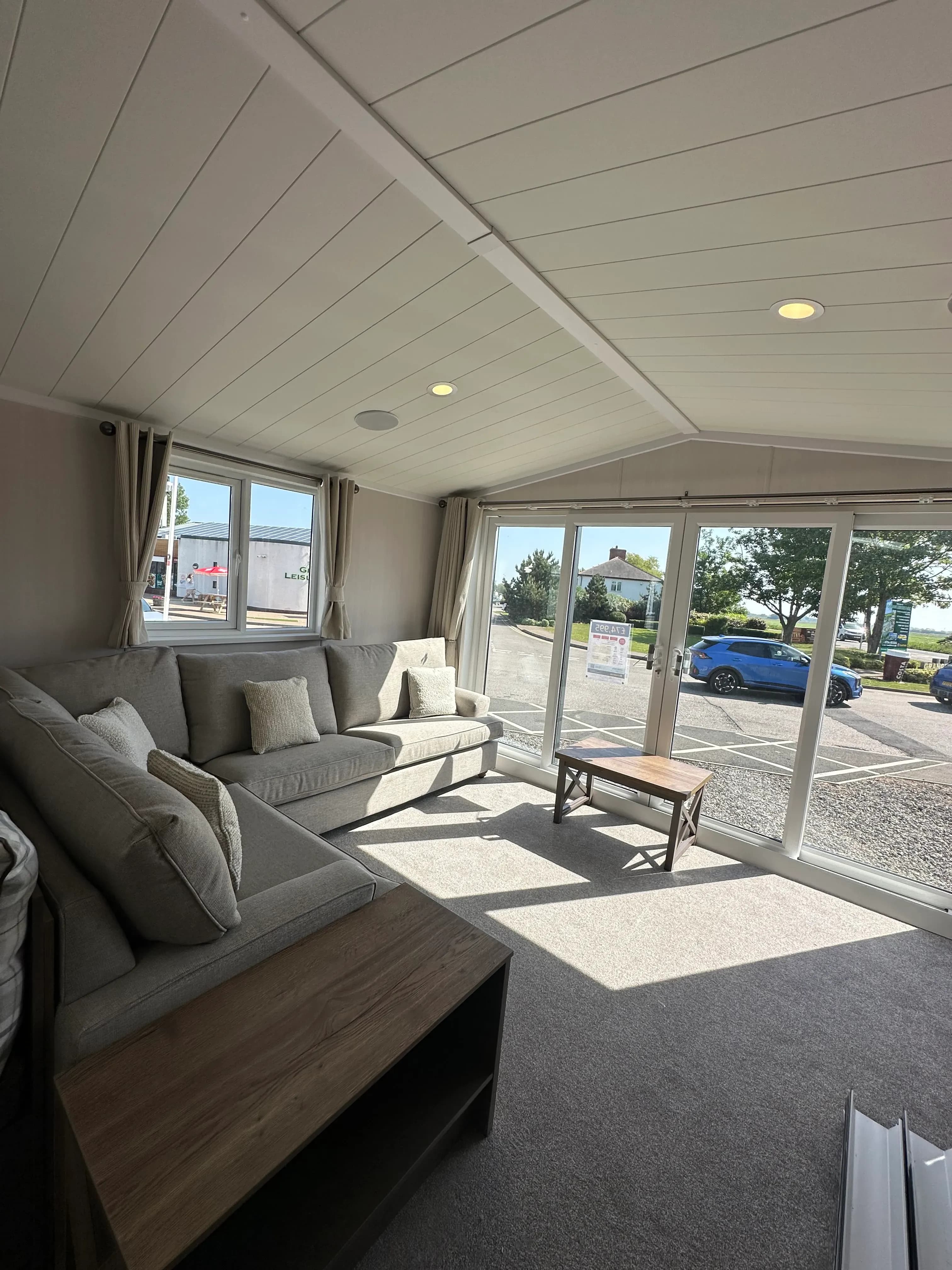 Open-plan lounge with patio doors in the 2026 Swift Morlaix lodge